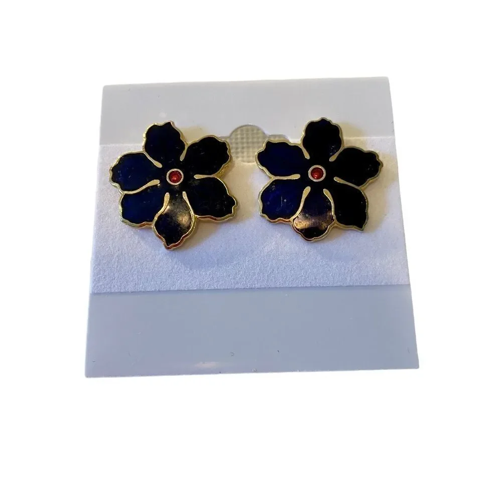 Dark Blue & Gold Toned Posts. Red Crystal in the center.